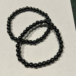 6mm Hematite (one) on stretch cord